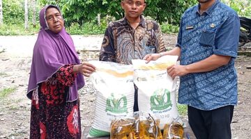 Ratusan Warga Simpang Jernih Terima Bantuan Pangan Bappenas, Total 15,7 Ton Beras Disalurkan
