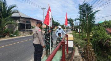 Polsek dan Koramil Peureulak Barat Perkuat Semangat Kebangsaan Lewat Pemasangan Bendera Merah Putih